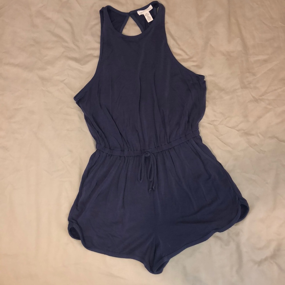 Purple romper. Super comfy feel.